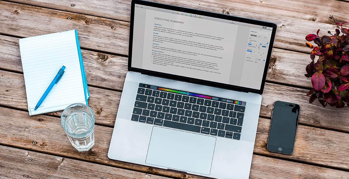 Computer with technical requirements on screen our work desk in Berwyn